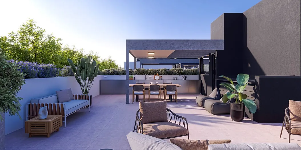 Rooftop with sofas, a pergola and greenery all around